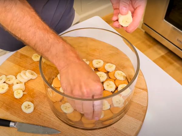 Ensure the bananas are evenly distributed throughout the pudding without mashing them.