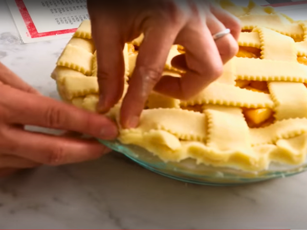 Use your thumb and forefinger to pinch the crusts together.