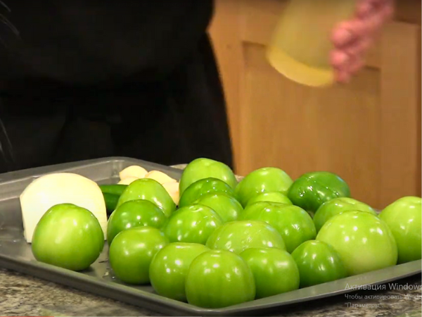 Preparing The Tomatillo Sauce  Place the tomatillos, onion, garlic, and jalapeño on a baking sheet. 1