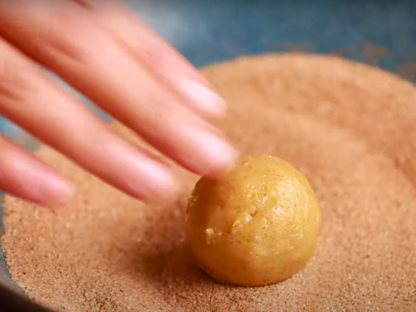 Pumpkin Snickerdoodle Cookies Recipe - Next, place the dough portion in your hands and roll it into a smooth ball.