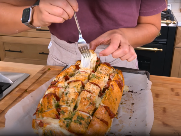 Remove the bread from the oven and let it cool slightly before serving