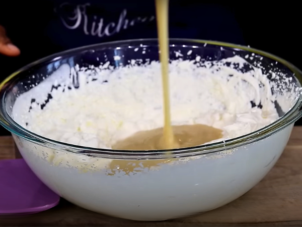 recipe Decadent Vanilla Ice Cream - Mix the Egg Yolks and Sugar: In a separate bowl, whisk together the egg yolks and sugar until the mixture is pale and thick