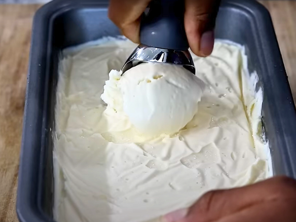 recipe Decadent Vanilla Ice Cream - Freeze the Ice Cream: Transfer the churned ice cream to an airtight container and freeze for at least 2 hours before serving.